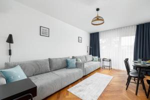 Χώρος καθιστικού στο Apartamenty Na Wydmach by Noclegi Renters