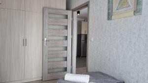 Giường trong phòng chung tại Q Apart Eden +30 ảnh