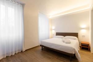 Postel nebo postele na pokoji v ubytování BB Maltagliati