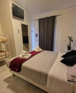 Ένα ή περισσότερα κρεβάτια σε δωμάτιο στο Residenza Le Rose