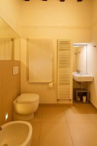 Koupelna v ubytování Masone Home + 3 fotografie