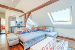 Ένα ή περισσότερα κρεβάτια σε δωμάτιο στο Appartement proche Strasbourg