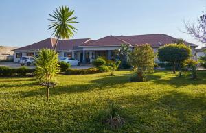 Κήπος έξω από το Mawi Homes