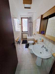 Koupelna v ubytování Valentyna Home