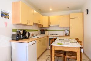 Kuchyň nebo kuchyňský kout v ubytování Le Gîte À Mamie + 19 fotografií