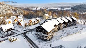 Το Wonder Home - Apartamenty z balkonami i ogródkami, blisko stoku narciarskiego Karpatka i szlaków turystycznych τον χειμώνα