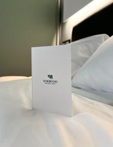 Giường trong phòng chung tại Maiorano boutique hotel