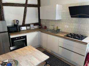 Køkken eller tekøkken på appartement le fil d'or