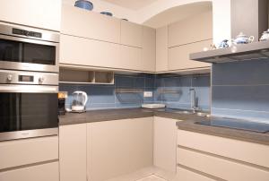 Η κουζίνα ή μικρή κουζίνα στο Cozy mountain escape near Como lake