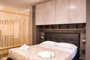 Ένα ή περισσότερα κρεβάτια σε δωμάτιο στο Cozy mountain escape near Como lake