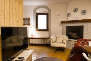 Μια τηλεόραση ή/και κέντρο ψυχαγωγίας στο Cozy mountain escape near Como lake