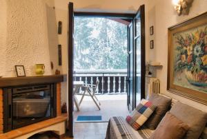 Istumisnurk majutusasutuses Nido tra i Pini in Cassina Valsassina