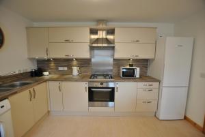 Köök või kööginurk majutusasutuses Seaside Nook- stylish stay by the sea