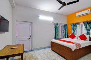 Postel nebo postele na pokoji v ubytování OYO Flagship The Image A Quality Stay