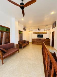 Posezení v ubytování Mkunazini Heritage Hostels