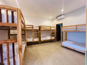 Postel nebo postele na pokoji v ubytování Mkunazini Heritage Hostels