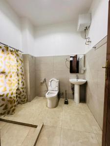 Koupelna v ubytování Mkunazini Heritage Hostels + 59 fotografií