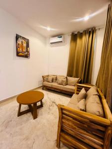 Posezení v ubytování Mkunazini Heritage Hostels