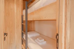 Una cama o camas en una habitación de Les Hauts de Val Stunning Apartment with Panoramic View