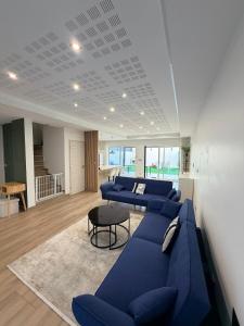 Posezení v ubytování Villa de 120m2 avc jardin 3 chambres 8 Voyageurs