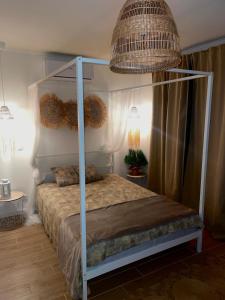 Ένα ή περισσότερα κρεβάτια σε δωμάτιο στο Maçussa Country House