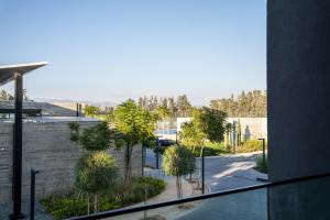 a view of a street from a window of a building at Luxe One Residence in Aglantzia