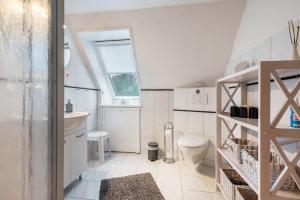 Koupelna v ubytování Ferienwohnung Timmermann 1 + 46 fotografií