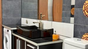 Nhà bếp/bếp nhỏ tại Zdrojowy Zakątek by LibertaRent +13 ảnh