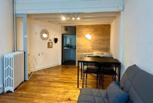 Et opholdsområde på Duplex république + 3 billeder