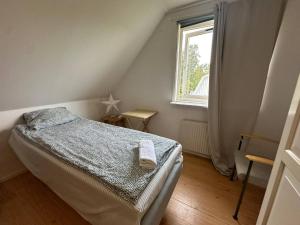 Кровать или кровати в номере Family & Worker Accommodations in Göteborg