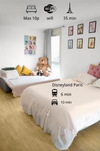 Postel nebo postele na pokoji v ubytování Studio proche de Disneyland Paris