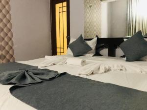 Postel nebo postele na pokoji v ubytování Hill Tips Tea Bangalow