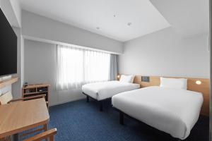 Postel nebo postele na pokoji v ubytování Sotetsu Fresa Inn Kyoto-Kiyomizu Gojo + 39 fotografií