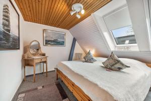 Postel nebo postele na pokoji v ubytování Ferienwohnung Timmermann 1