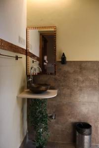 Ένα μπάνιο στο Vibes Inn Singing Tree