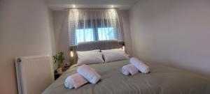 Ένα ή περισσότερα κρεβάτια σε δωμάτιο στο Matin's cozy nest