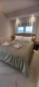 Ένα ή περισσότερα κρεβάτια σε δωμάτιο στο Matin's cozy nest