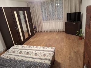 Ένα ή περισσότερα κρεβάτια σε δωμάτιο στο Casa Szabo Vata Bai +5 φωτογραφίες