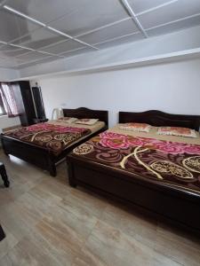 Una cama o camas en una habitación de Rc home stay