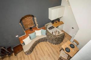 an overhead view of a living room with a couch at Gesuiti Home - Lumina Collection in Catania +16 photos