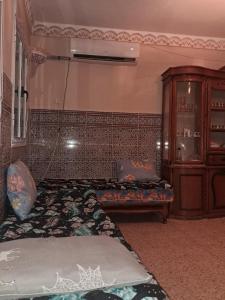 Ένα ή περισσότερα κρεβάτια σε δωμάτιο στο Tlemcen +33 φωτογραφίες