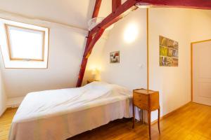 Postel nebo postele na pokoji v ubytování L'Hirondelle - La Cipière Gîtes + 14 fotografií