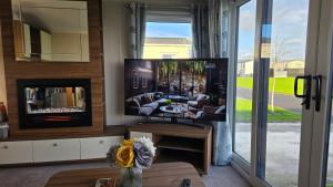 Μια τηλεόραση ή/και κέντρο ψυχαγωγίας στο Cranfield Bay Getaway