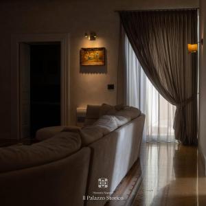 Giường trong phòng chung tại Palazzo Pecci