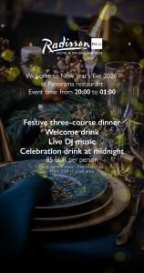 een flyer voor een restaurant met een bord eten bij Radisson Blu Hotel & Spa, Daugava Riga in Rīga