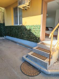 a set of stairs leading to a house at Alena'Studio in Gabrovo