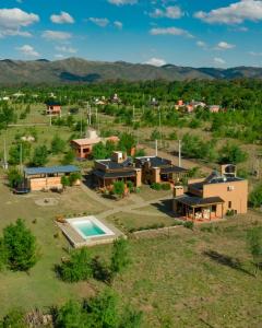 an aerial view of a house with a pool at Alebrijescalamuchita in Villa Ciudad Parque