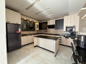 Η κουζίνα ή μικρή κουζίνα στο Luxury Stay