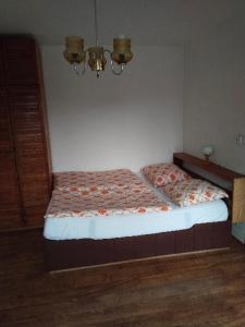 Ένα ή περισσότερα κρεβάτια σε δωμάτιο στο Penzion Farma Dolík