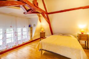 Postel nebo postele na pokoji v ubytování Le Rossignol - La Cipière Gîtes + 14 fotografií